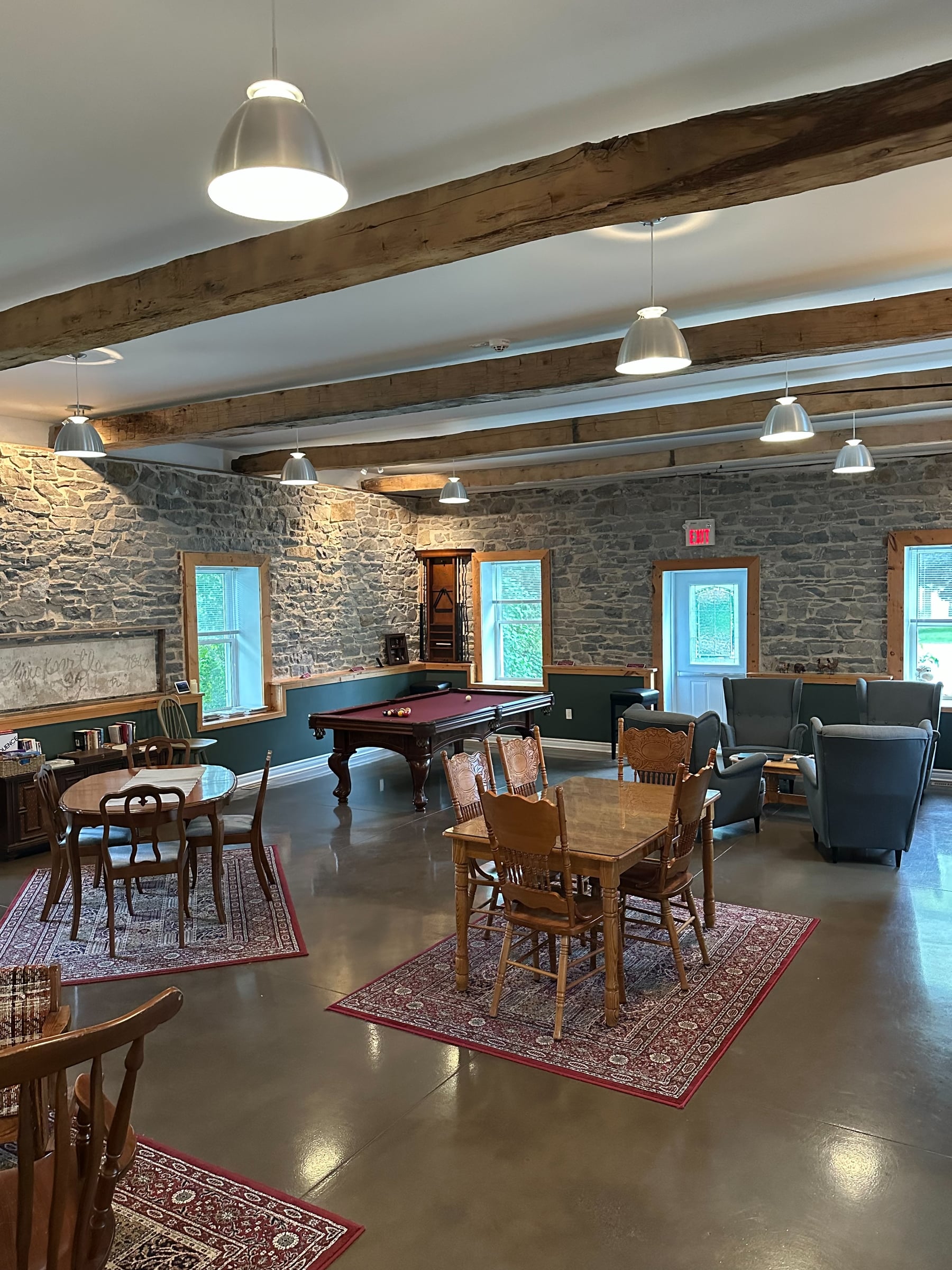 The original schoolhouse interior, now used as the main living and dining room